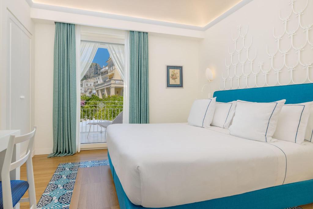 1 Bedroom, Magnolia, Suite, King Bed, Garden View, Sofa, Balcony