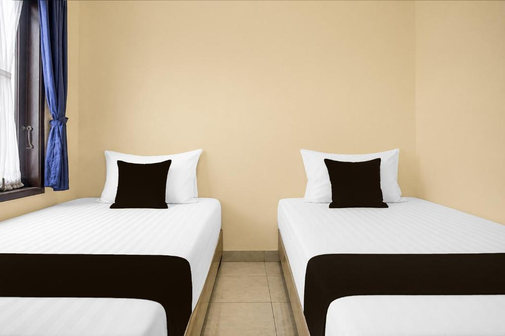 Room at Hotel O near Universitas Sumatera Utara formerly Golden Cempaka Guest House, MEDAN