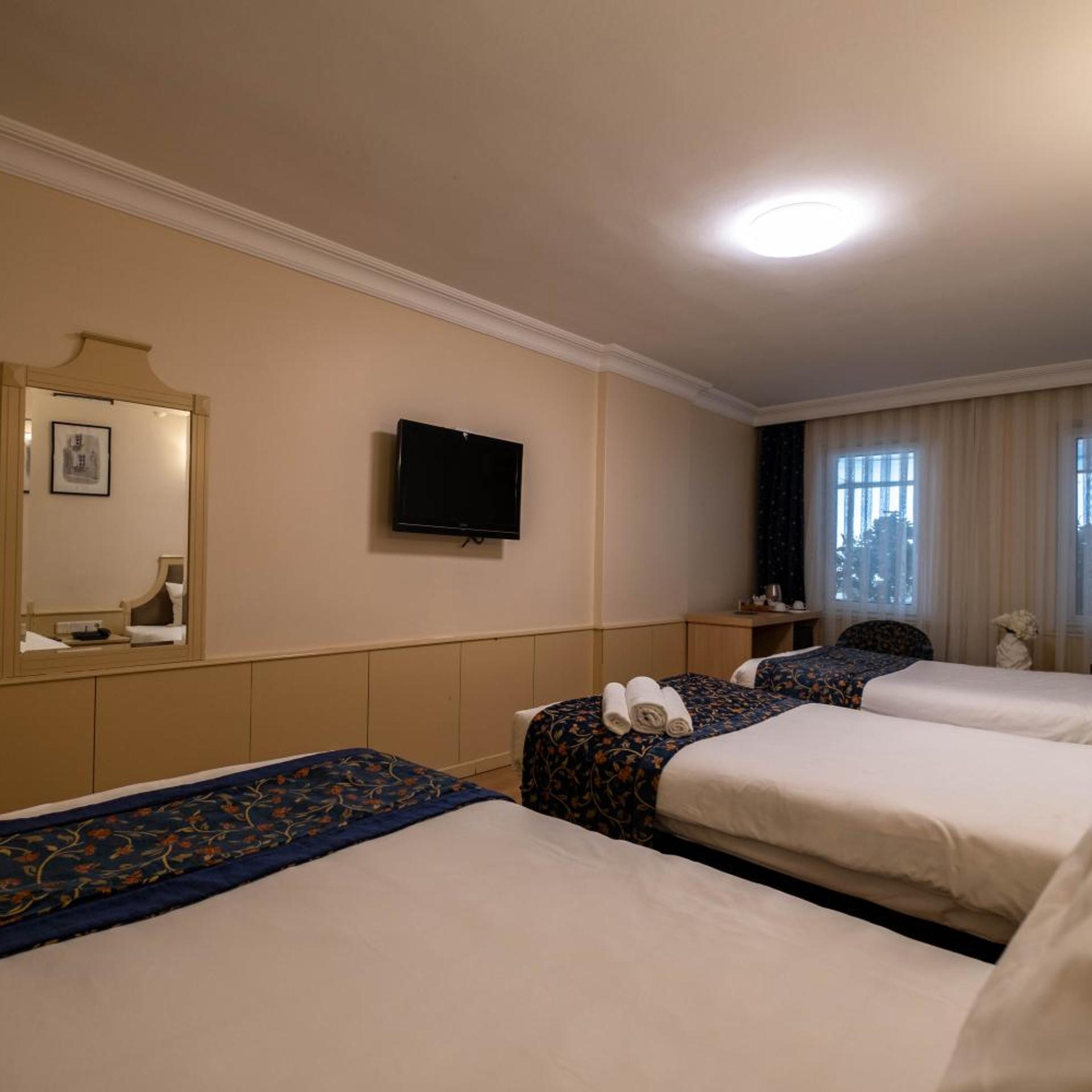 غرفة اقتصادية ثلاثية، Berr Hotel 6/9