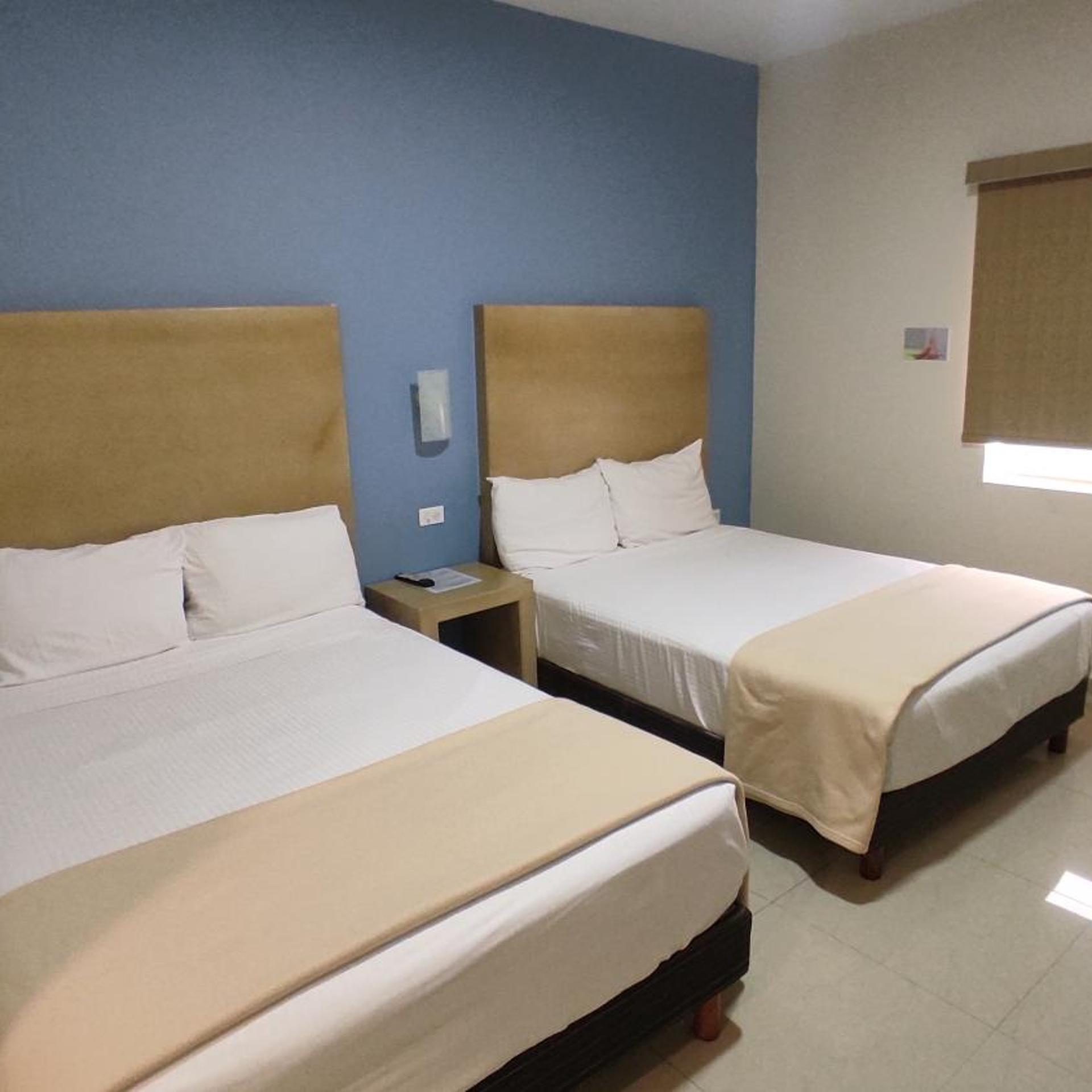 غرفة بسريرين منفصلين، Capital Hotel 2/7