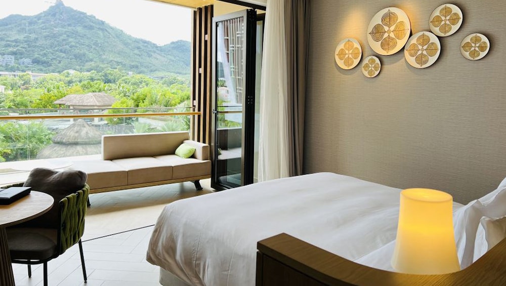 جناح بسرير كينج بغرفة نوم واحدة بمنطقة جلوس، Holiday Inn Resort Qionghai Guantang 2/5