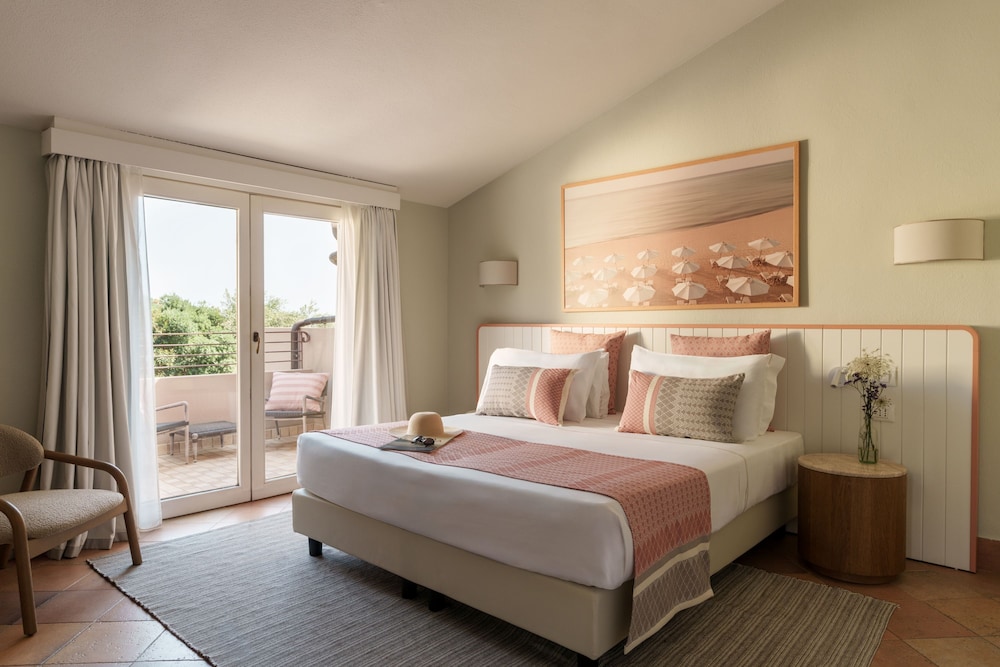 غرفة كلاسيكية عائلية بسرير مزدوج، Chia Laguna - Hotel Village 7/10