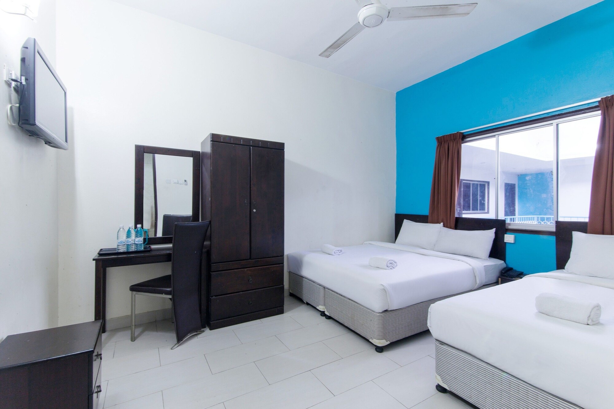 غرفة ثلاثية بسرير كوين وسرير فردي، Hotel Grand Mutiara 5/9