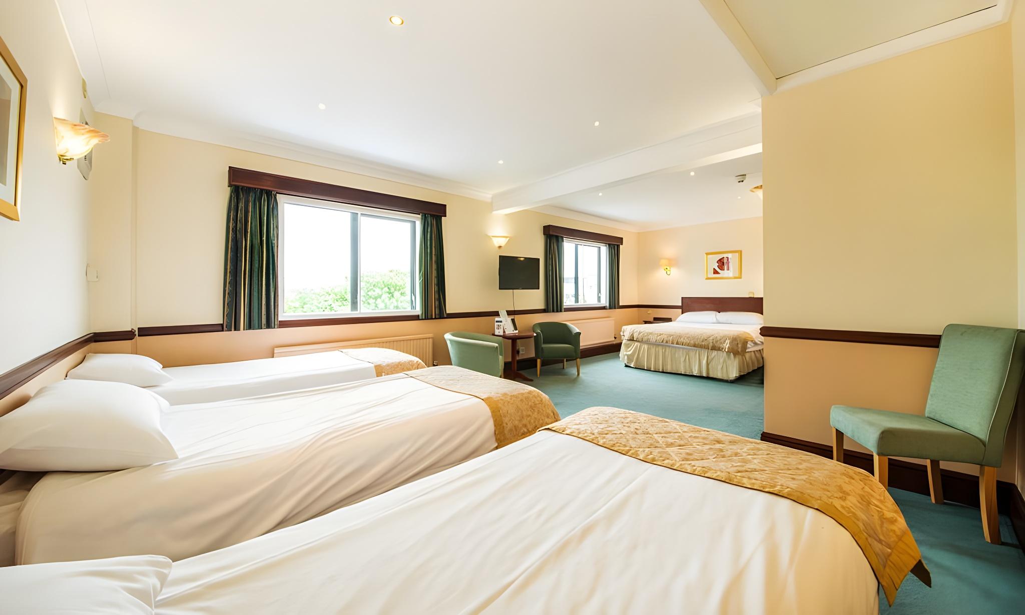 Family, 1 Double and 3 Single Beds