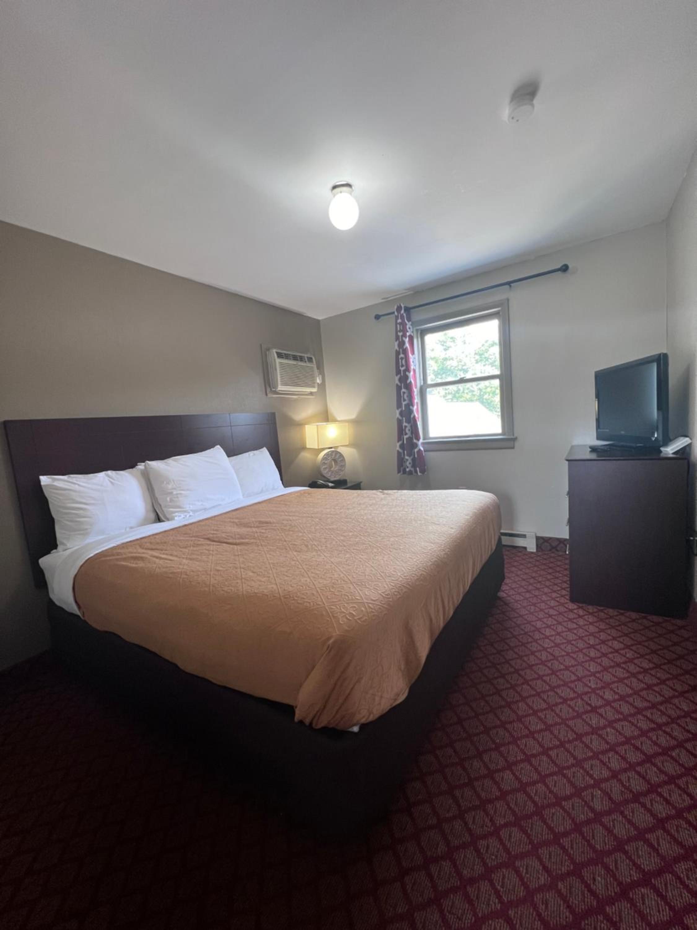 Suite, King Bed, 1 King and 2 Double Beds, Sofa