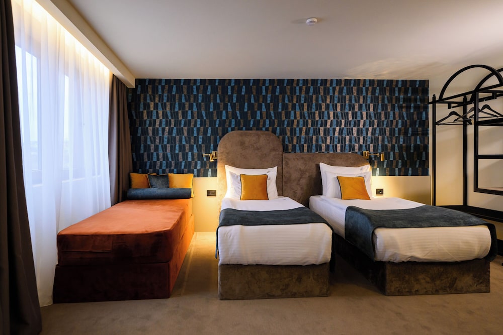 غرفة بريميوم بسرير كينج مع أريكة، Artloft Hotel 2/10