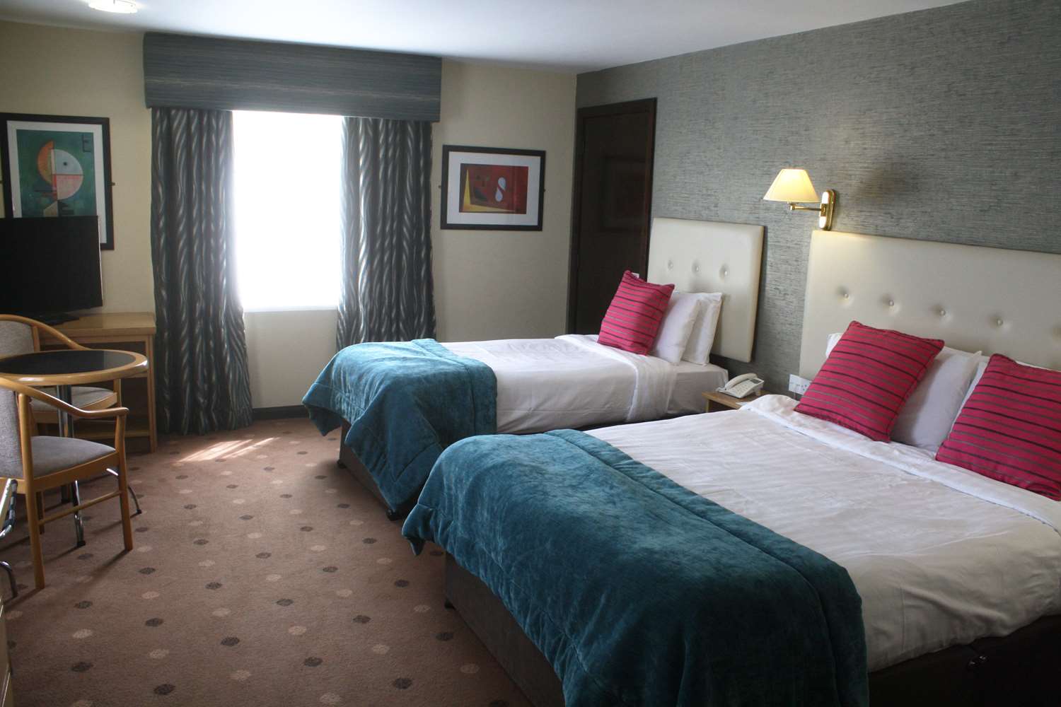 Deluxe, 1 Double and 1 Single Bed