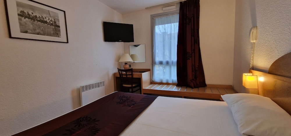 Kyriad Direct Arpajon 14/50