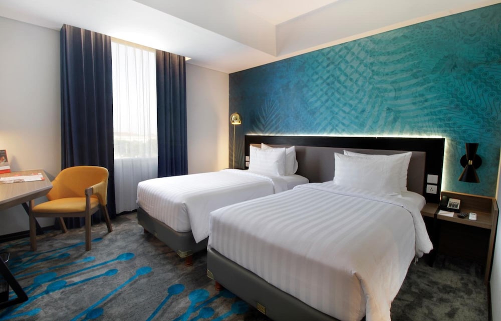 غرفة ديلوكس بسريرين منفصلين، Swiss-Belinn Airport Surabaya 3/4