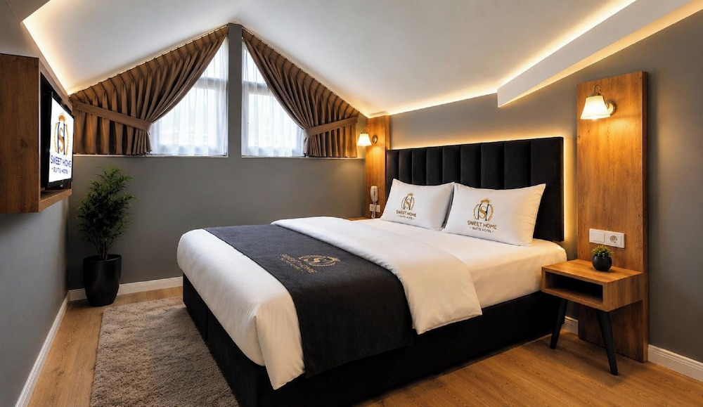 غرفة ملكية بسرير كوين بإطلالة على الحديقة، Sweet Home Suite Hotel 4/8