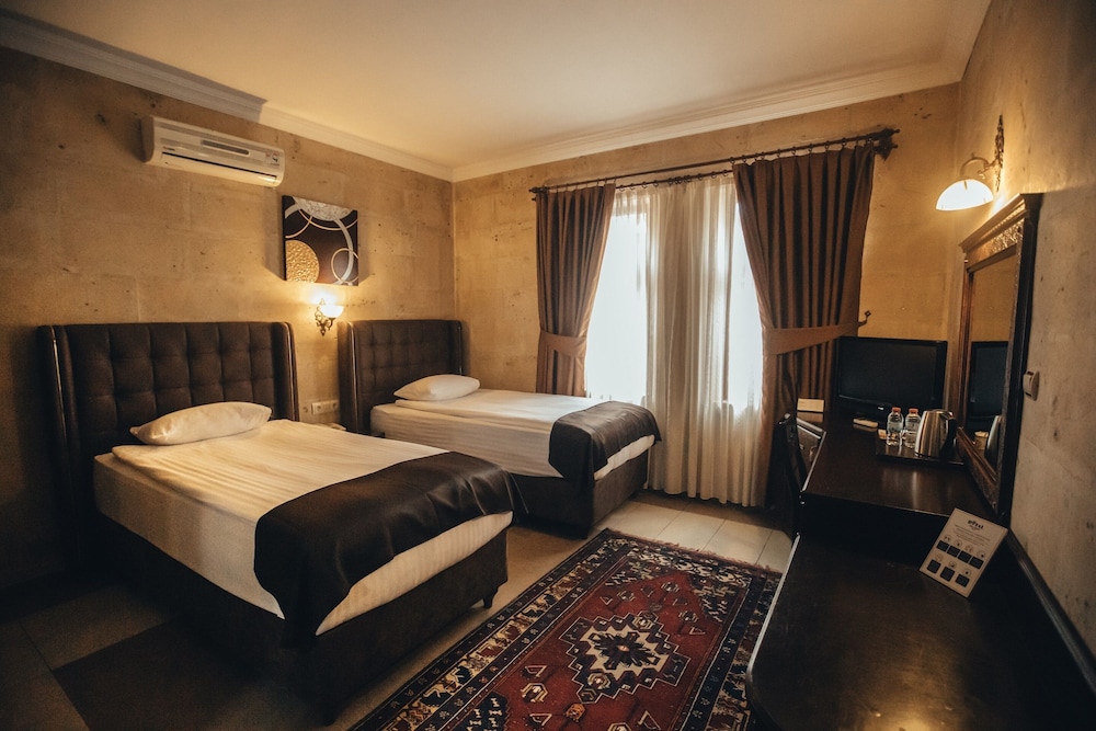 Stone, Deluxe, Quadruple, Double and Twin Beds