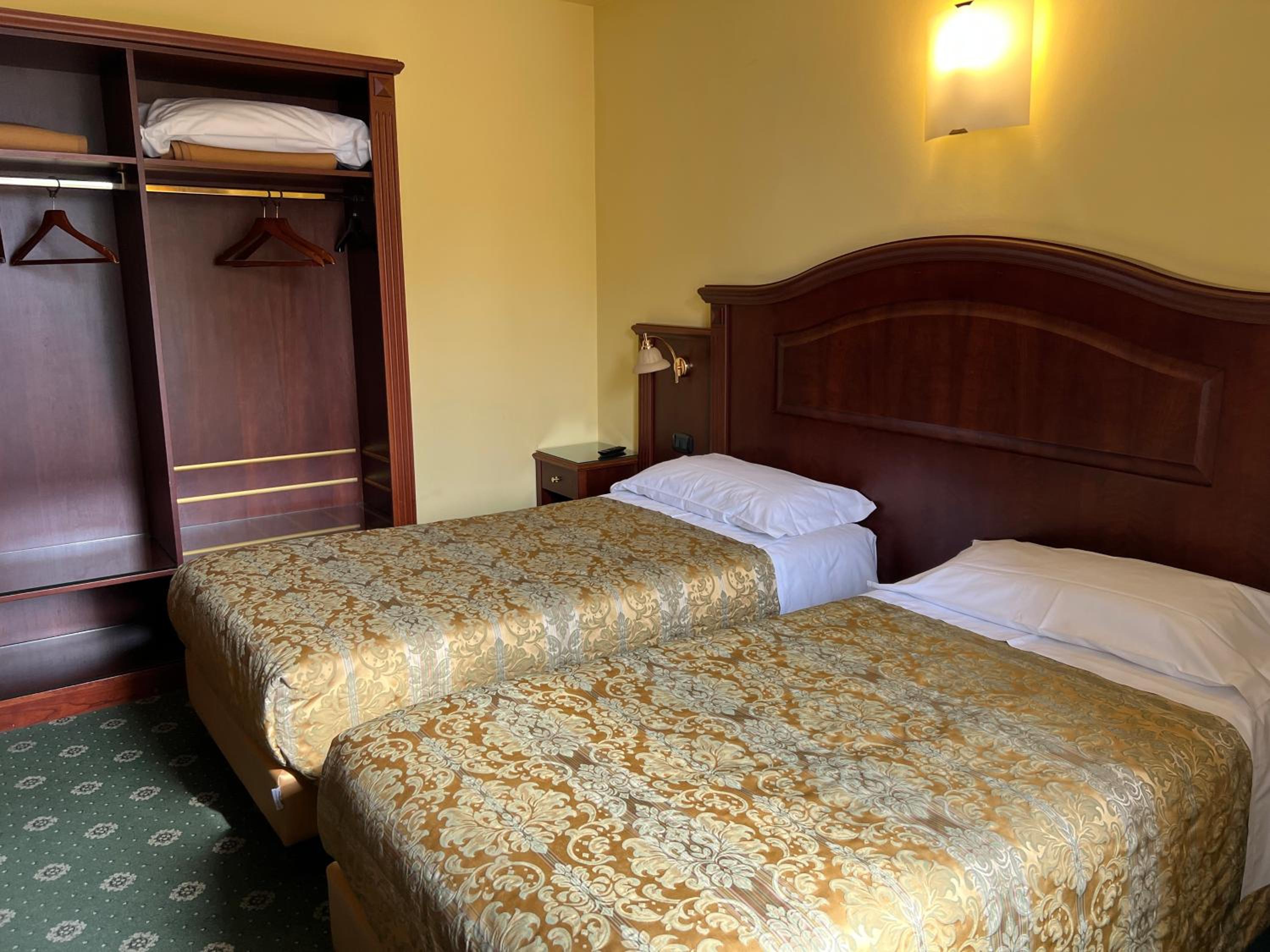 غرفة بسريرين منفصلين، Hotel Valganna Srl Ex Valganna 4/9