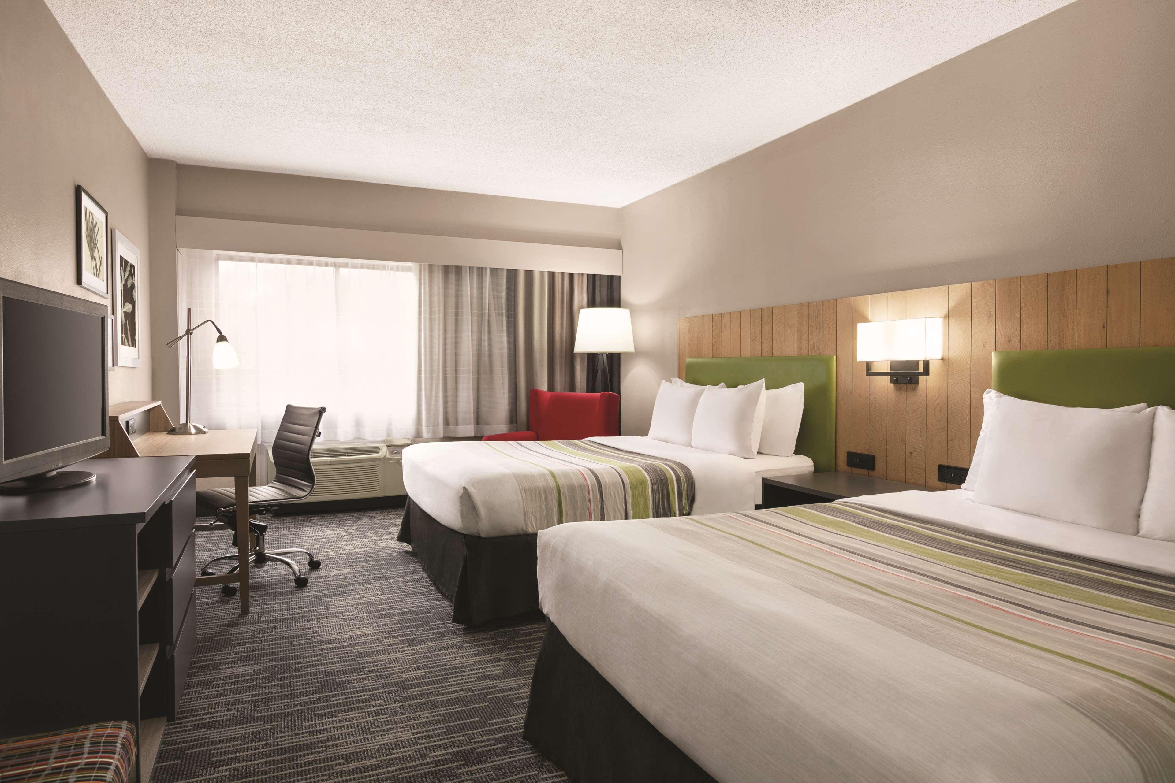 SUITE, 1 KING AND 2 QUEEN BEDS