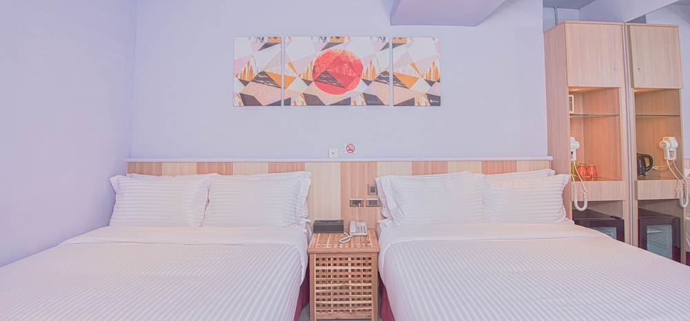 غرفة بريميوم رباعية بسريرين مزدوجين بغرفة نوم واحدة، Macchi Hotel 3/5