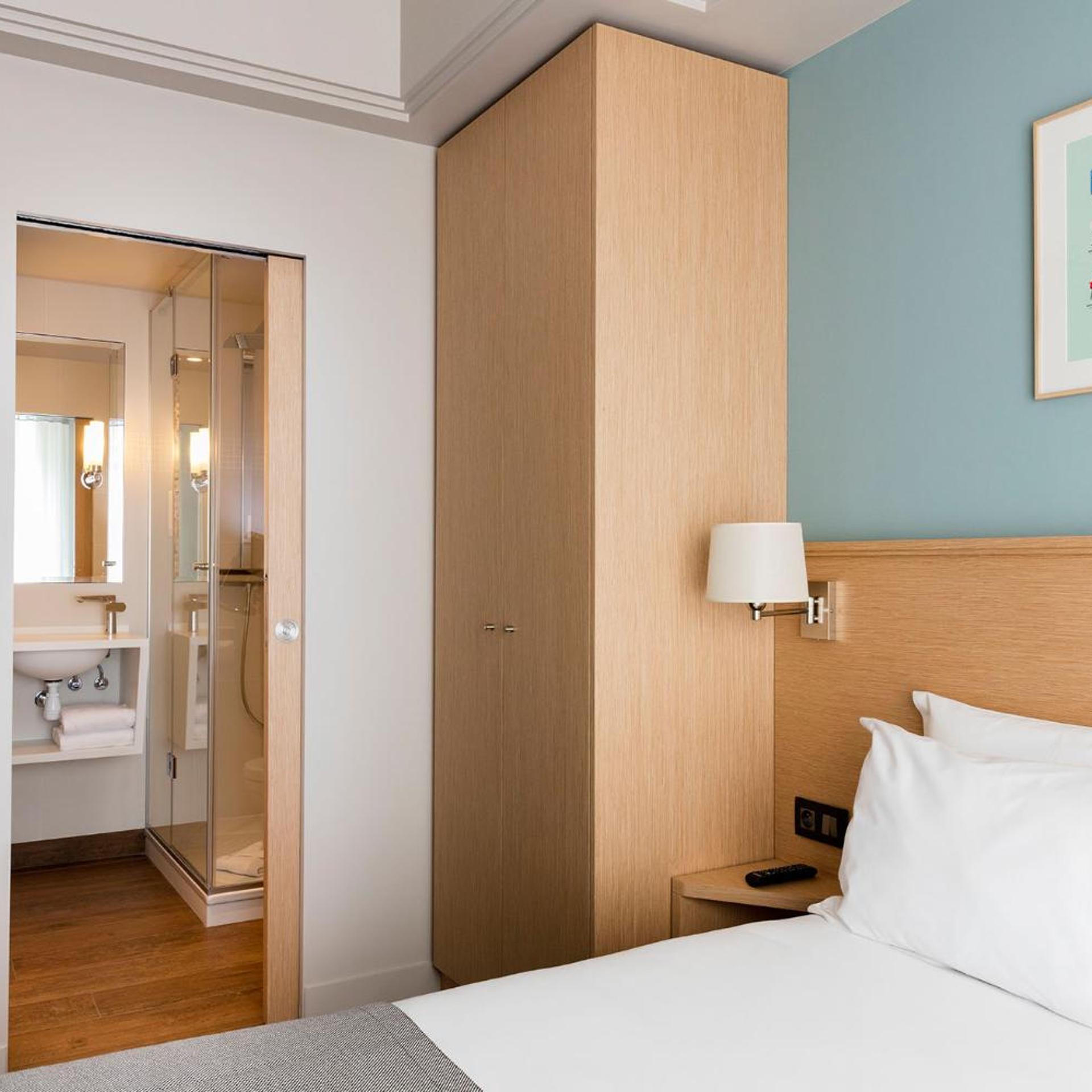 غرفة بسريرين منفصلين بإطلالة على الحديقة، Hotel Magellan 3/6