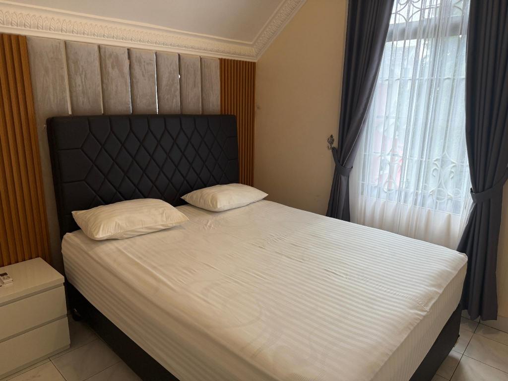 فيلا بسرير كوين وسرير مزدوج بإطلالة على الحديقة بغرفتي نوم، Eton Asia Kota Bunga Villas 3/5