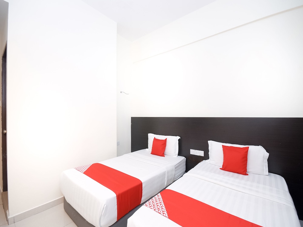 غرفة ديلوكس بسريرين منفصلين، Super Oyo 1148 Kenyalang Suite 2/4