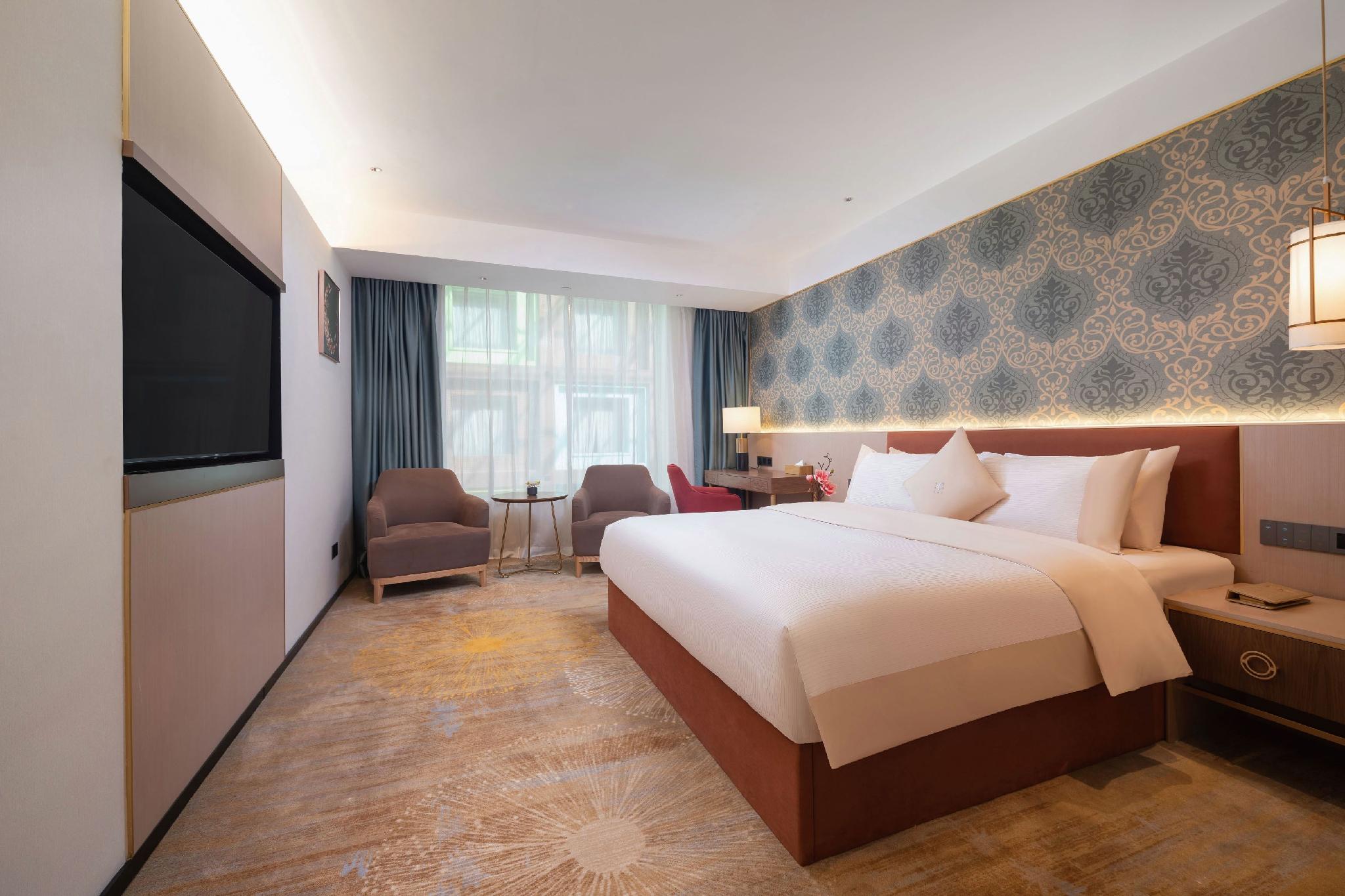 غرفة بريميوم بسرير كينج، Guangzhou Wogo Yuanbao Hotel (Zhujiang New Town) 2/2