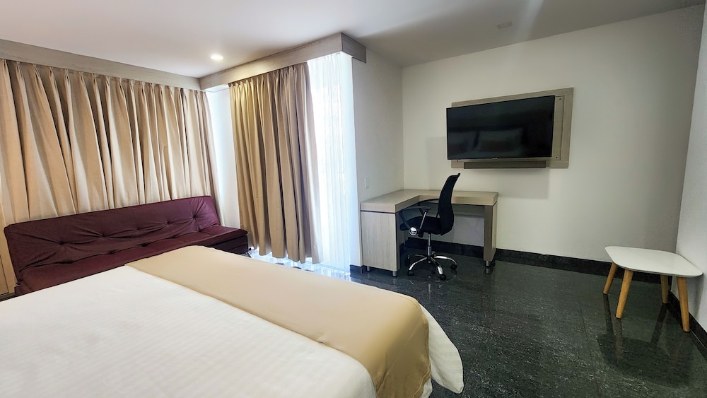 غرفة سوبيريور بسرير كينج مع أريكة، Hotel BE Suites Cali 8/10