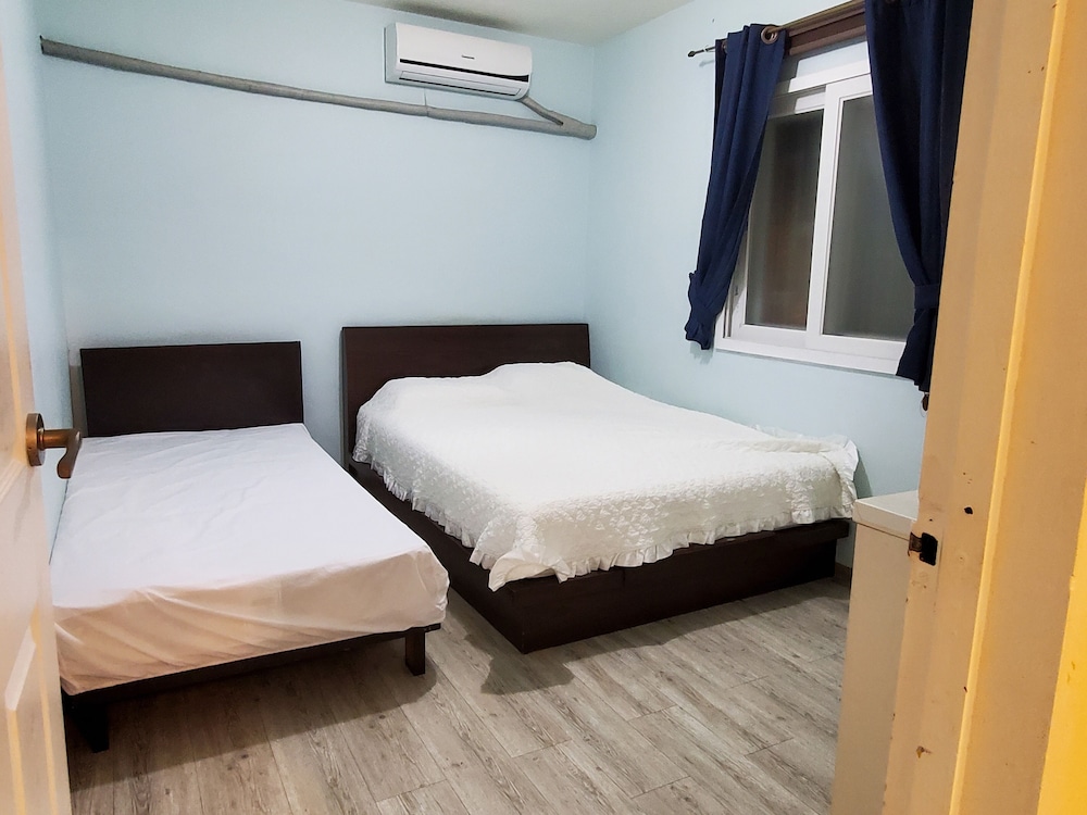 2 Bedrooms, Family Suite, 1 King and 2 Double Beds, City View, Sofa