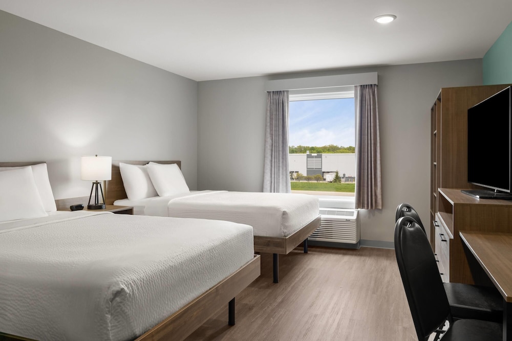 ECHO Suites Extended Stay by Wyndham 7/30