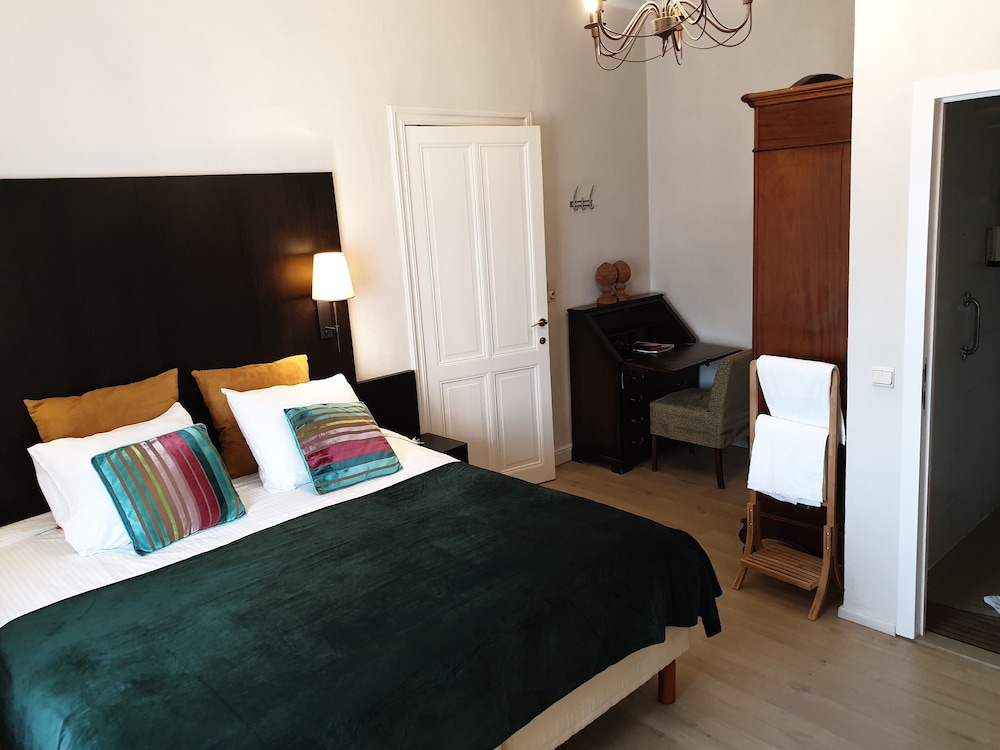 غرفة كلاسيكية رباعية بسرير كوين وسريرين منفصلين بغرفة نوم واحدة، Gulden Vlies Hotel 1/4