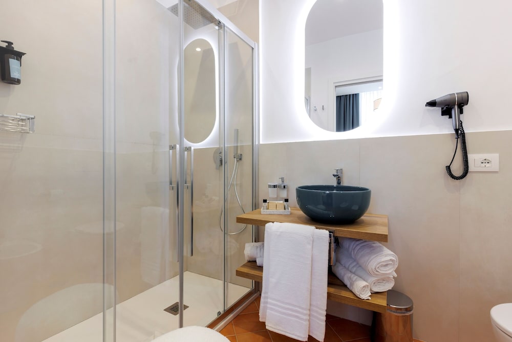 غرفة كلاسيكية ثلاثية بسرير مزدوج مع أريكة، D'Amalfi Hospitality 2/2