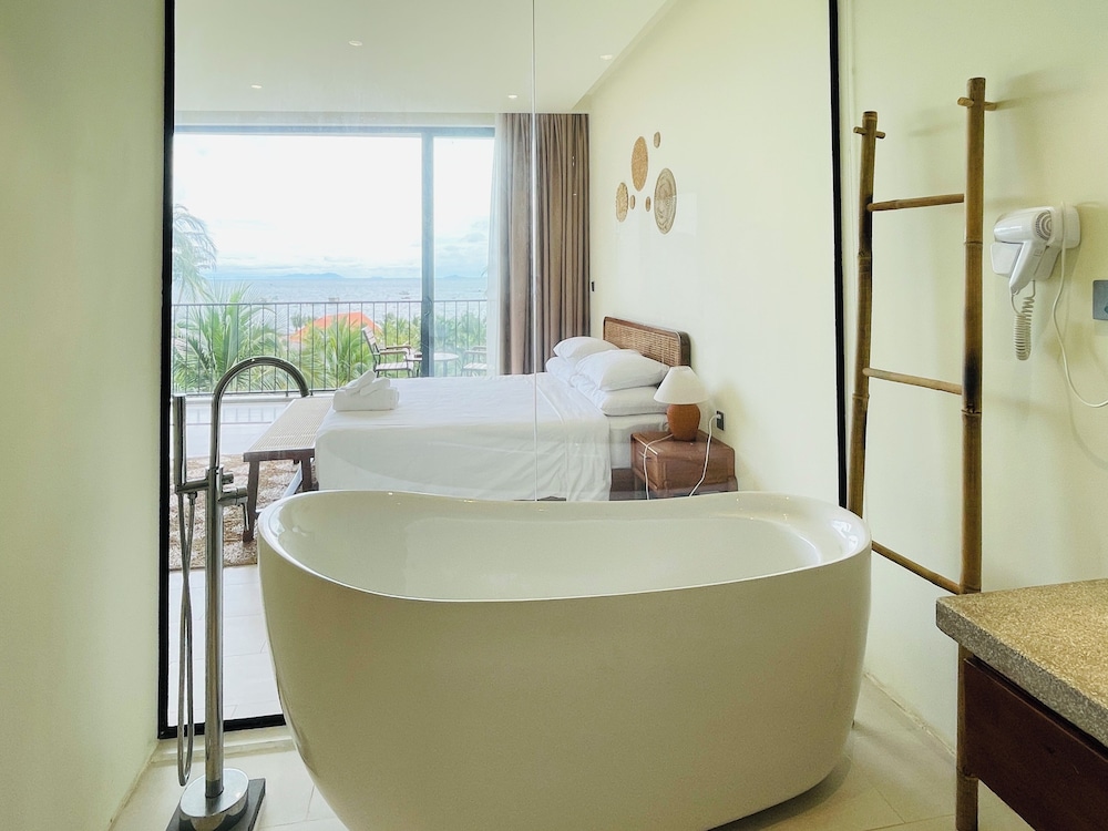 غرفة ديلوكس بسرير مزدوج بإطلالة على البحر بحوض استحمام، Coco Island Retreat Phu Quoc 4/4