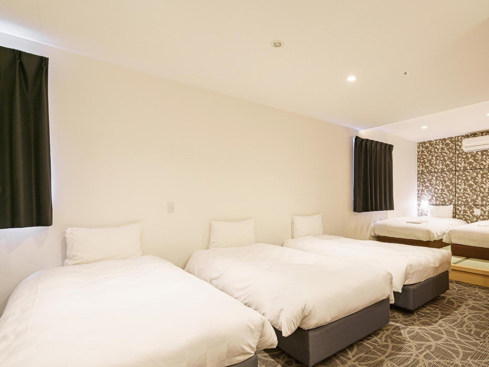 غرفة عائلية بسرير فردي، Sakura Garden Hotel 2/8