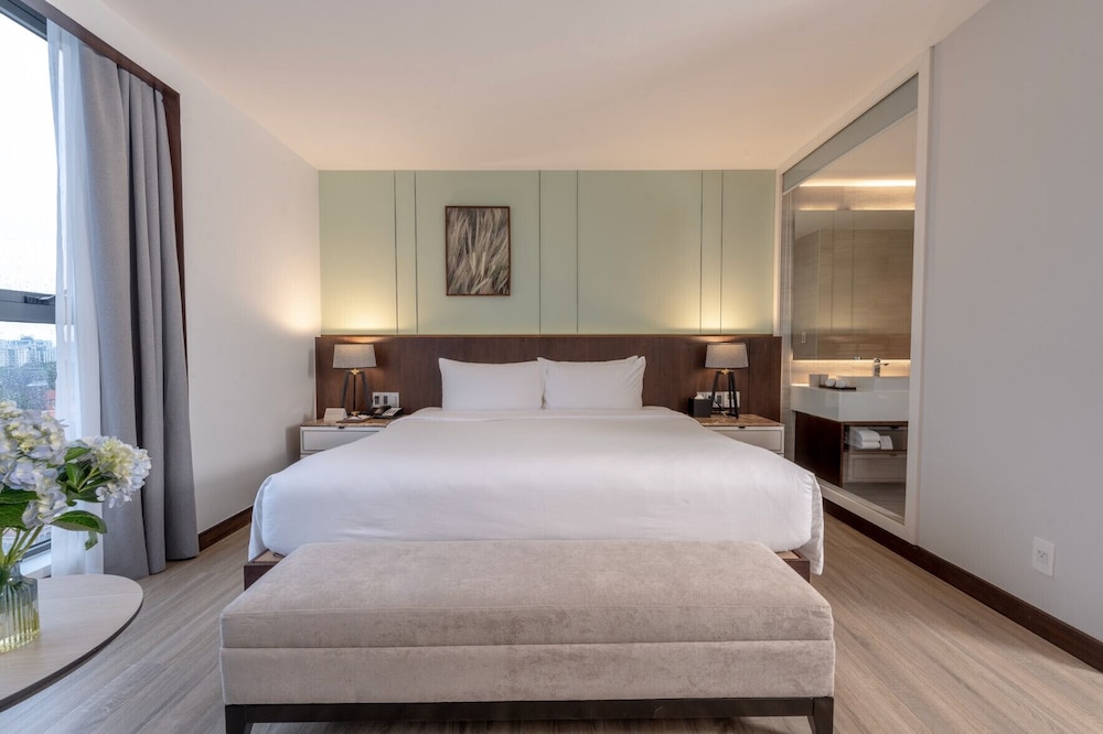 غرفة ديلوكس بسرير كينج، Signature By M Village Le Thanh Ton, a brand of Modern Village Lifestyle 4/4