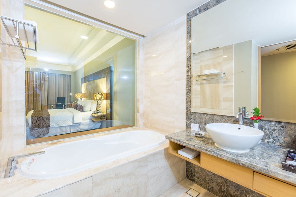 غرفة ديلوكس بسريرين منفصلين للمدخنين، Wyndham Surabaya City Centre 5/7