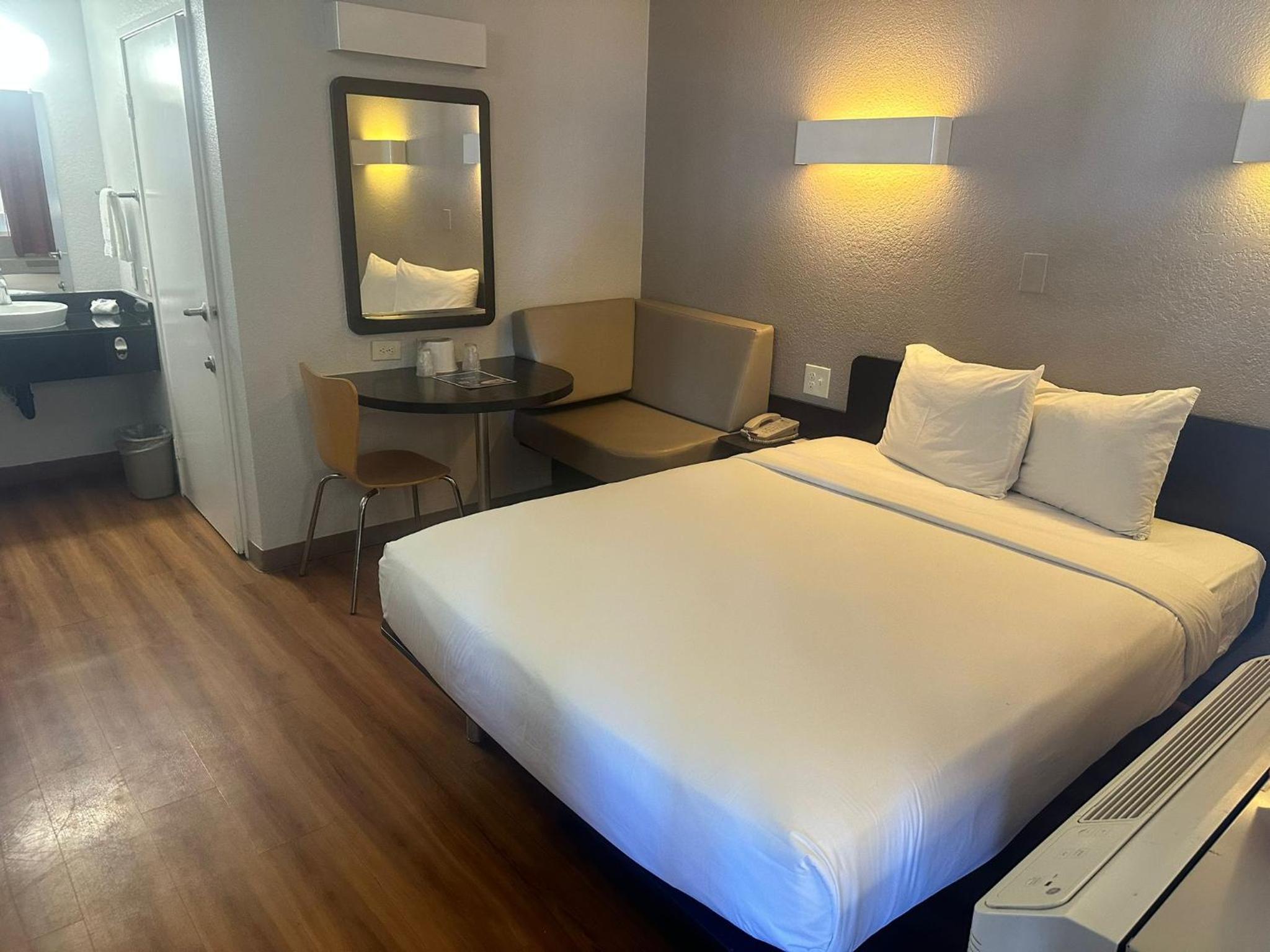 1 Queen Bed - Mini Fridge