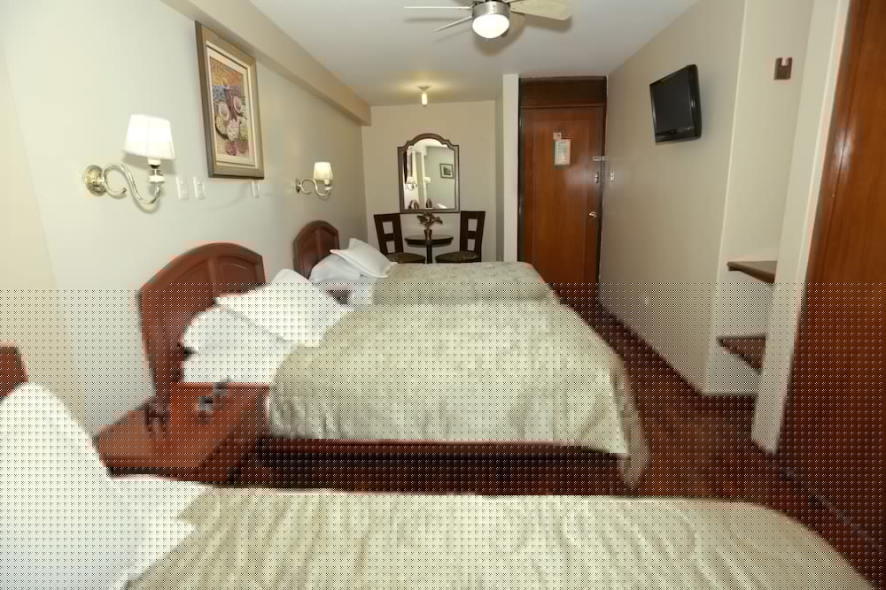 MANHATTAN INN AIRPORT HOTEL 13/73