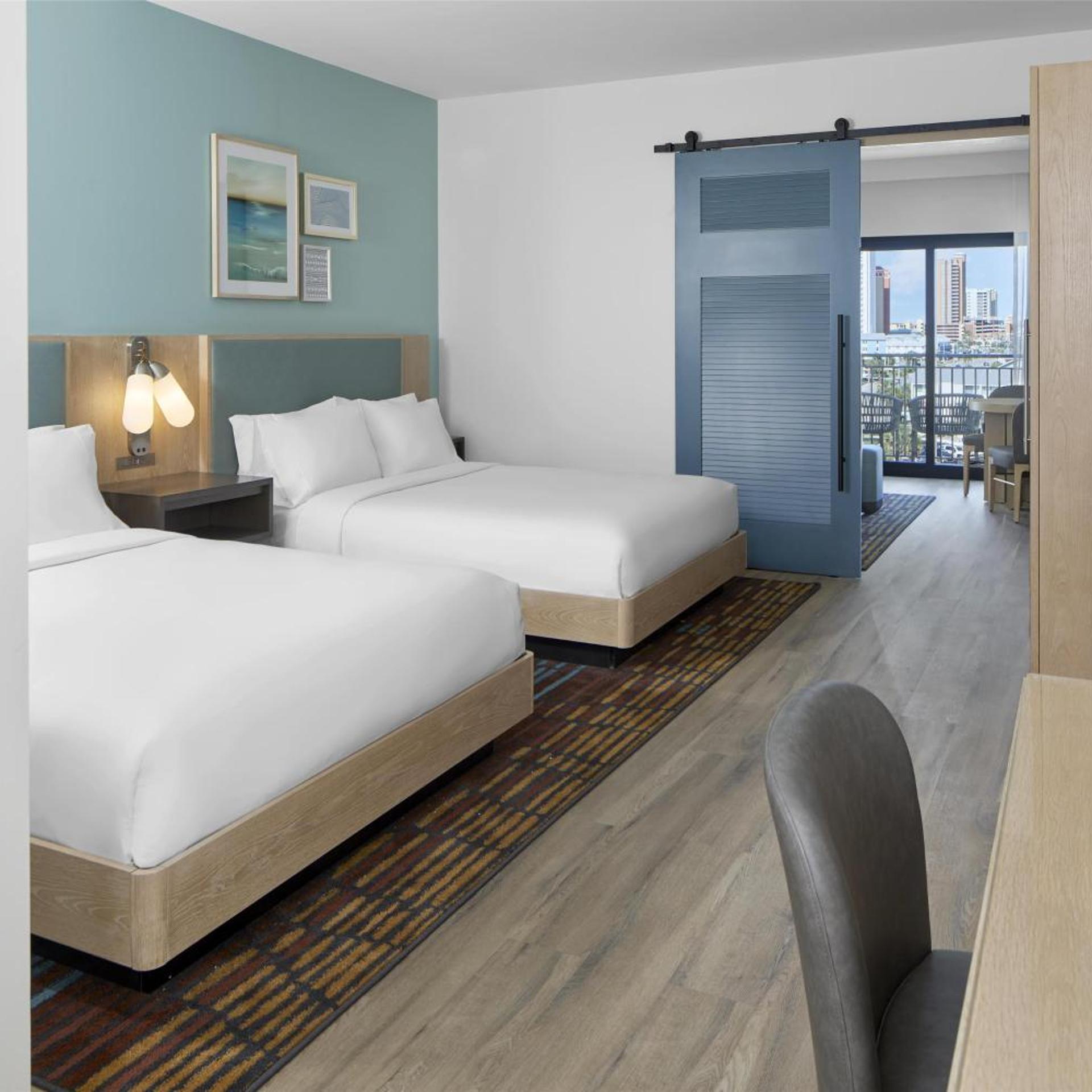Suite, 2 Queen Beds, Partial View, Sofa, Balcony