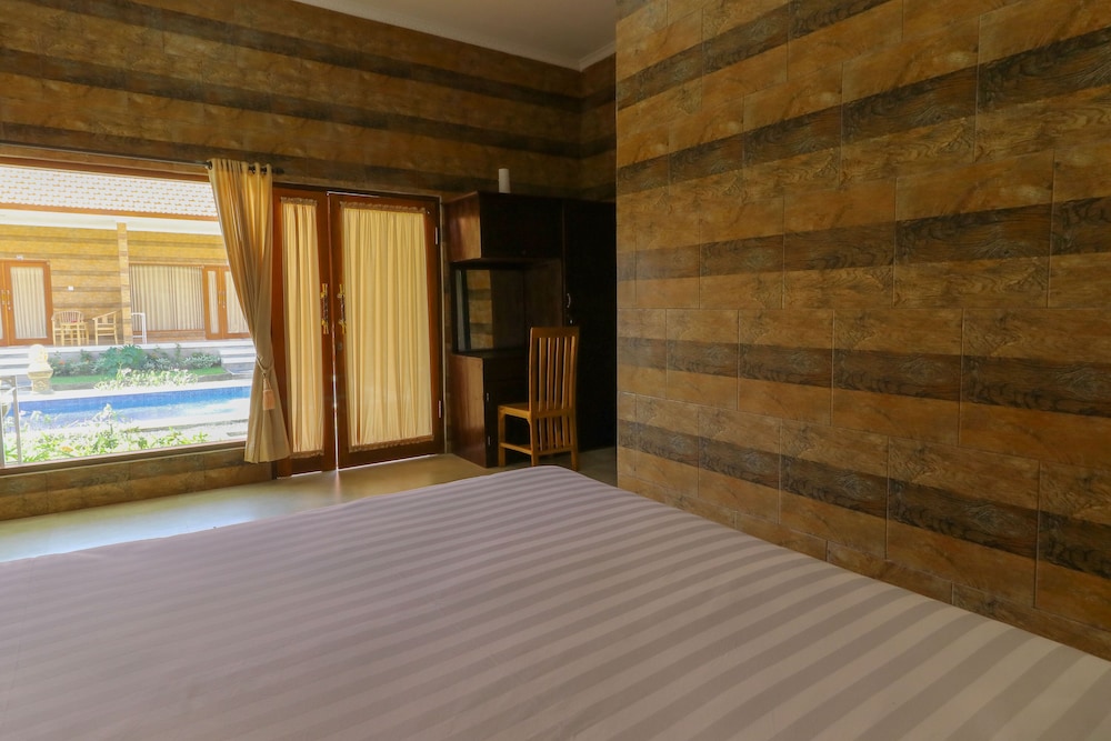 Manik Homestay by ZUZU 9/34