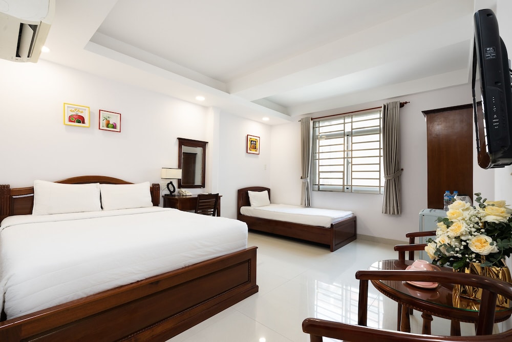 غرفة ديلوكس ثلاثية بسرير كوين وسرير فردي، Hoang Hoang Hotel (Bloom 3) 3/9