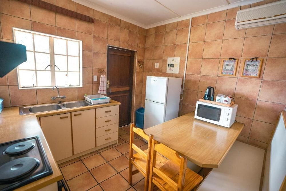 Olive Grove Guest Farm 50/50