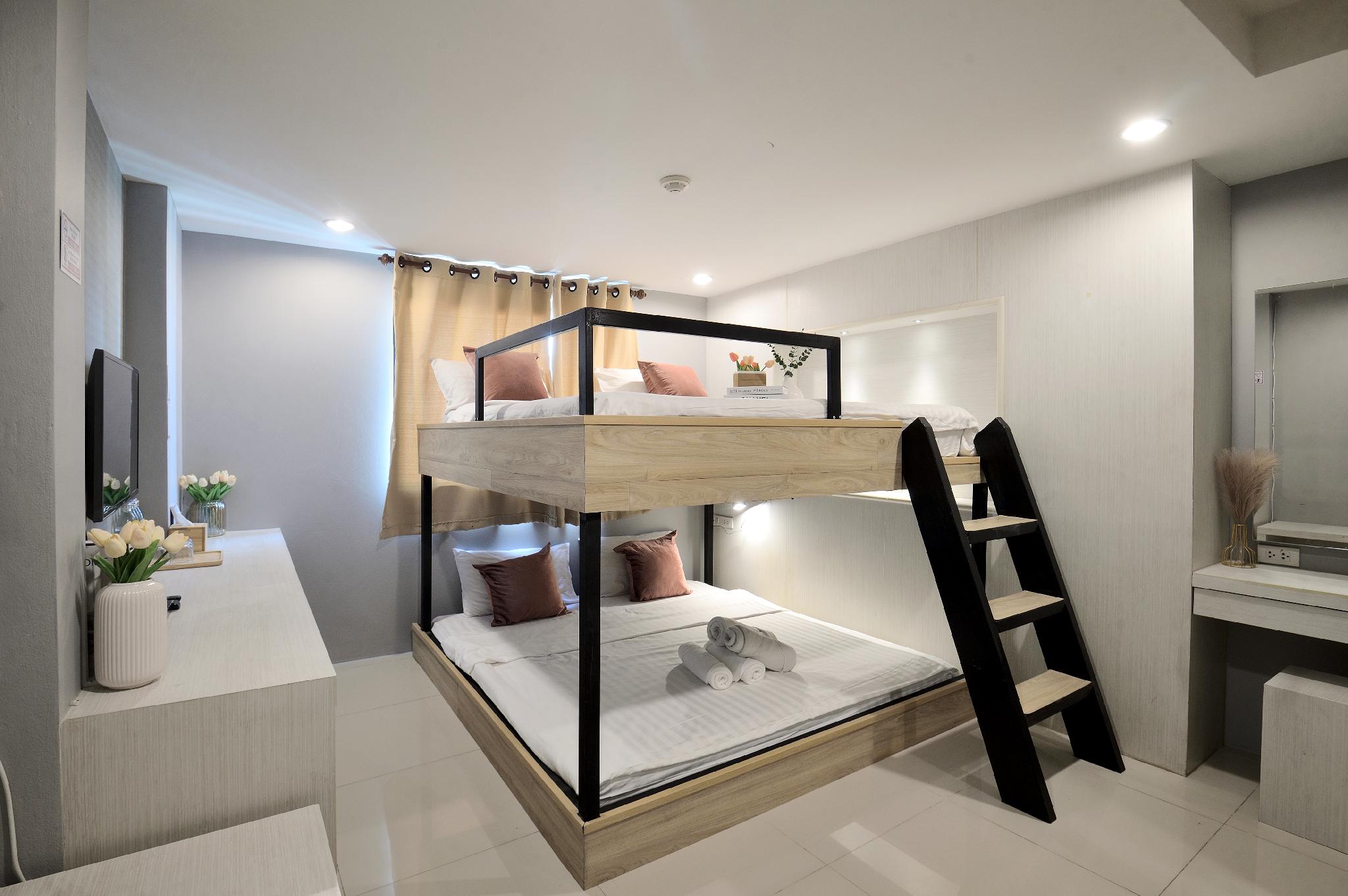 غرفة عائلية بأسرّة بطابقين