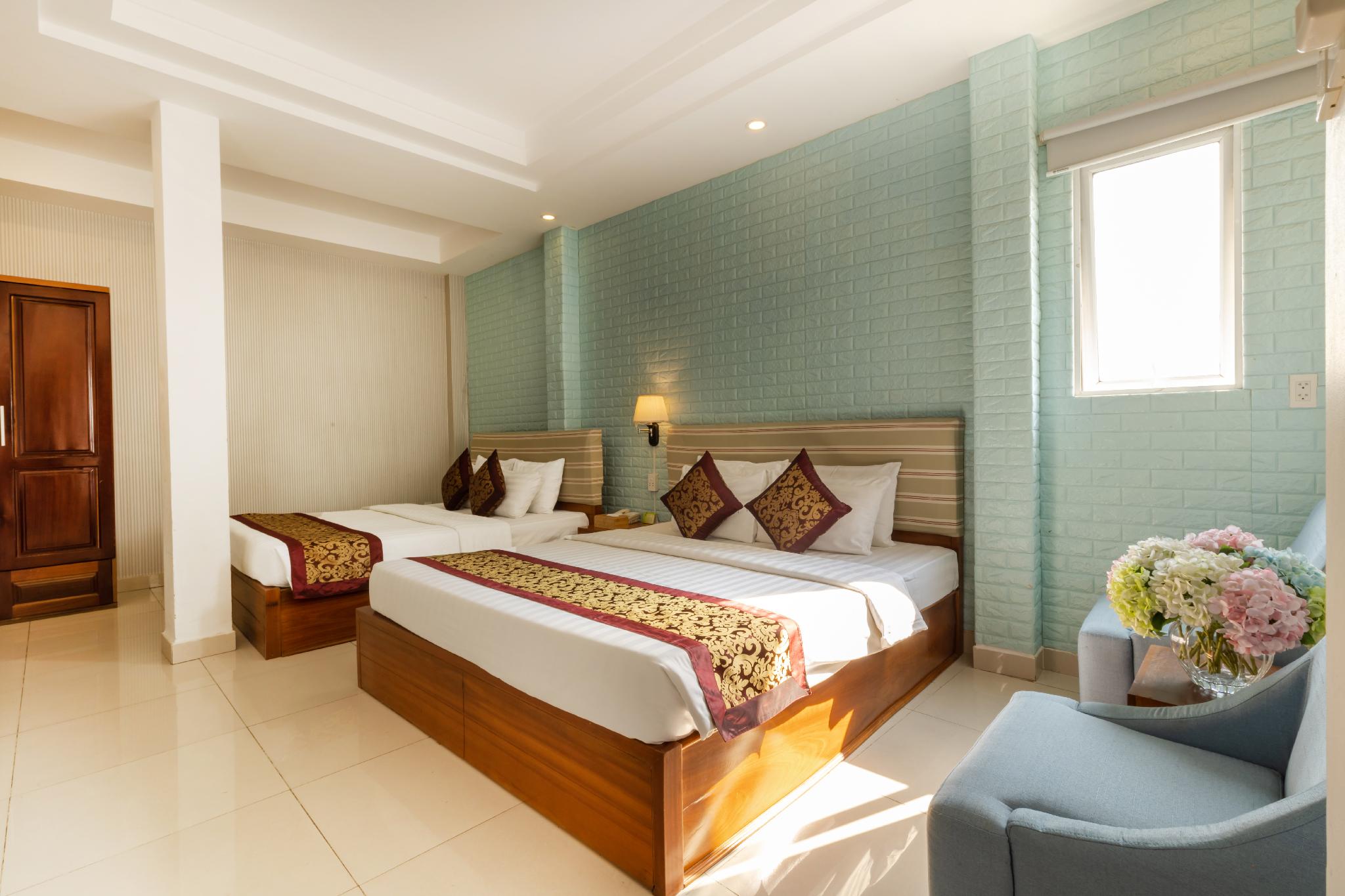غرفة عائلية بسرير كوين وسرير مزدوج، Airport Saigon Hotel 2/3