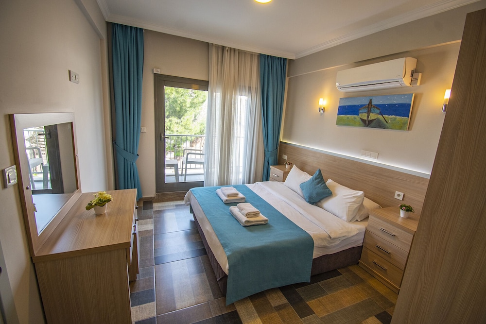 غرفة بسرير مزدوج بإطلالة على المدينة مع أريكة، M Suite Hotel 5/10