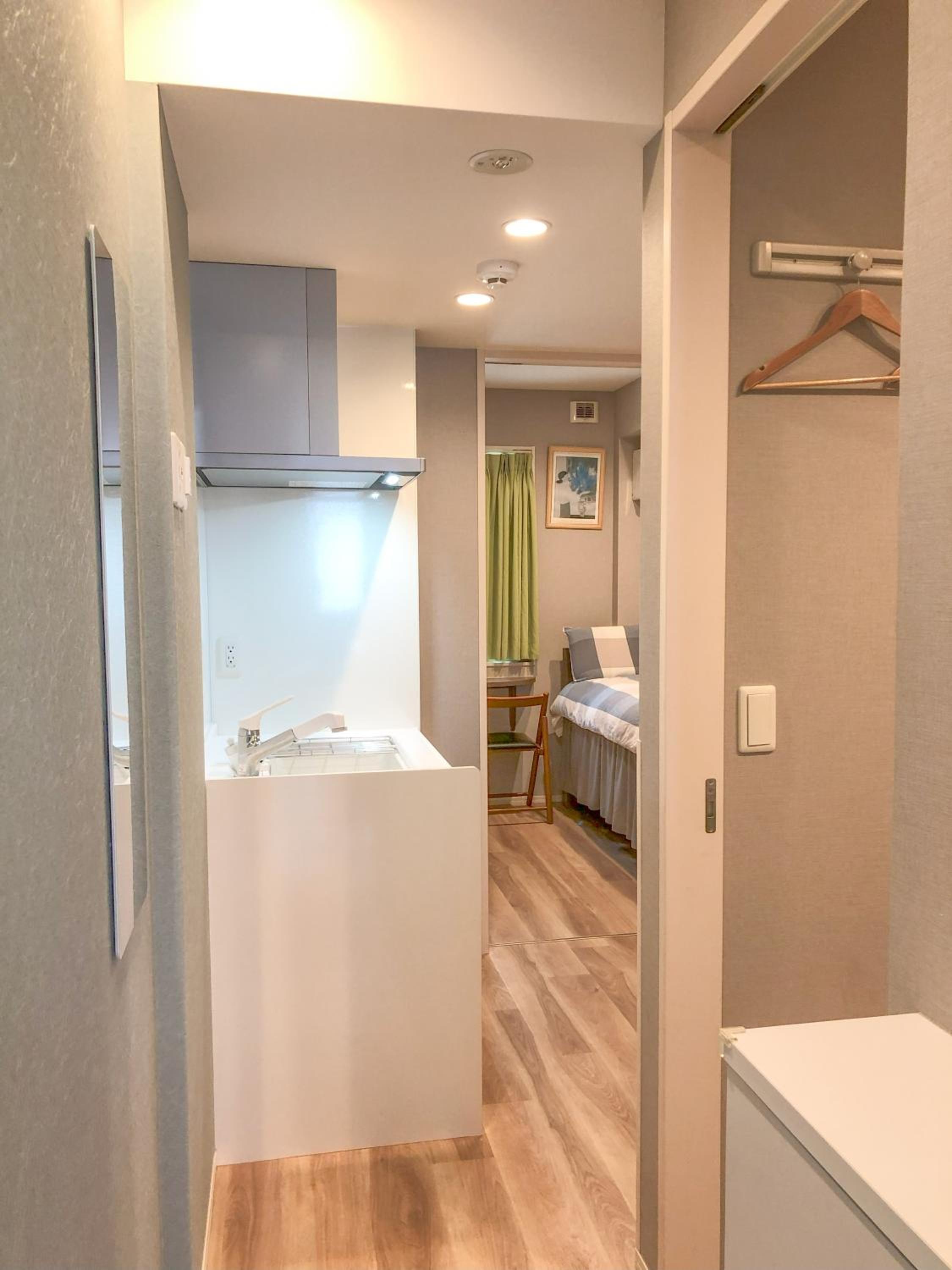 غرفة عائلية بسريرين مزدوجين في المبنى الرئيسي، Shinjuku Warm House 2/2