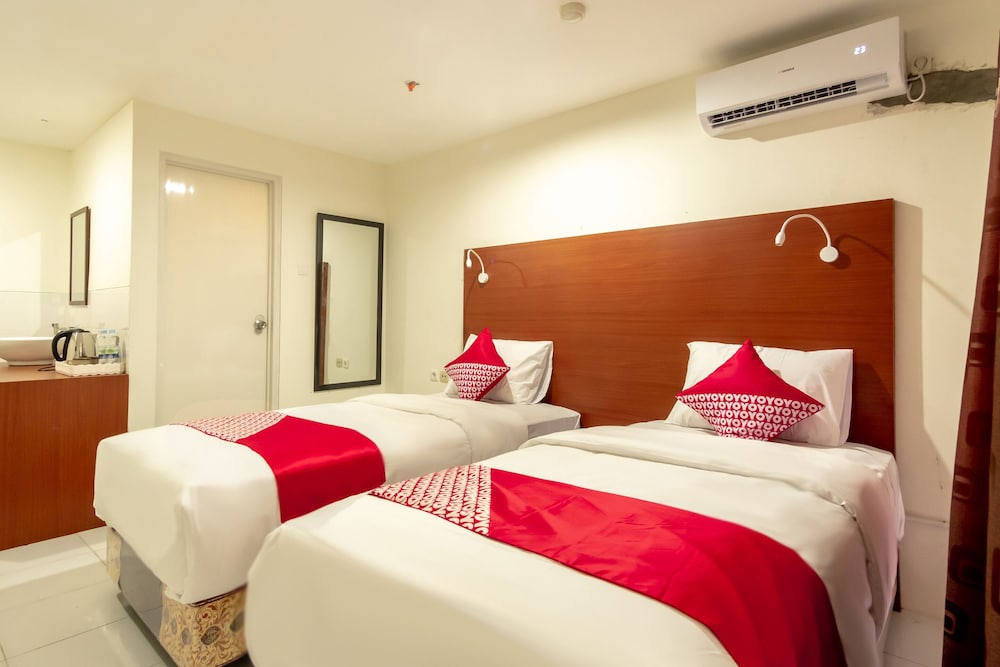 Oyo Flagship 1481 Apartemen Sentraland Medan 11/22