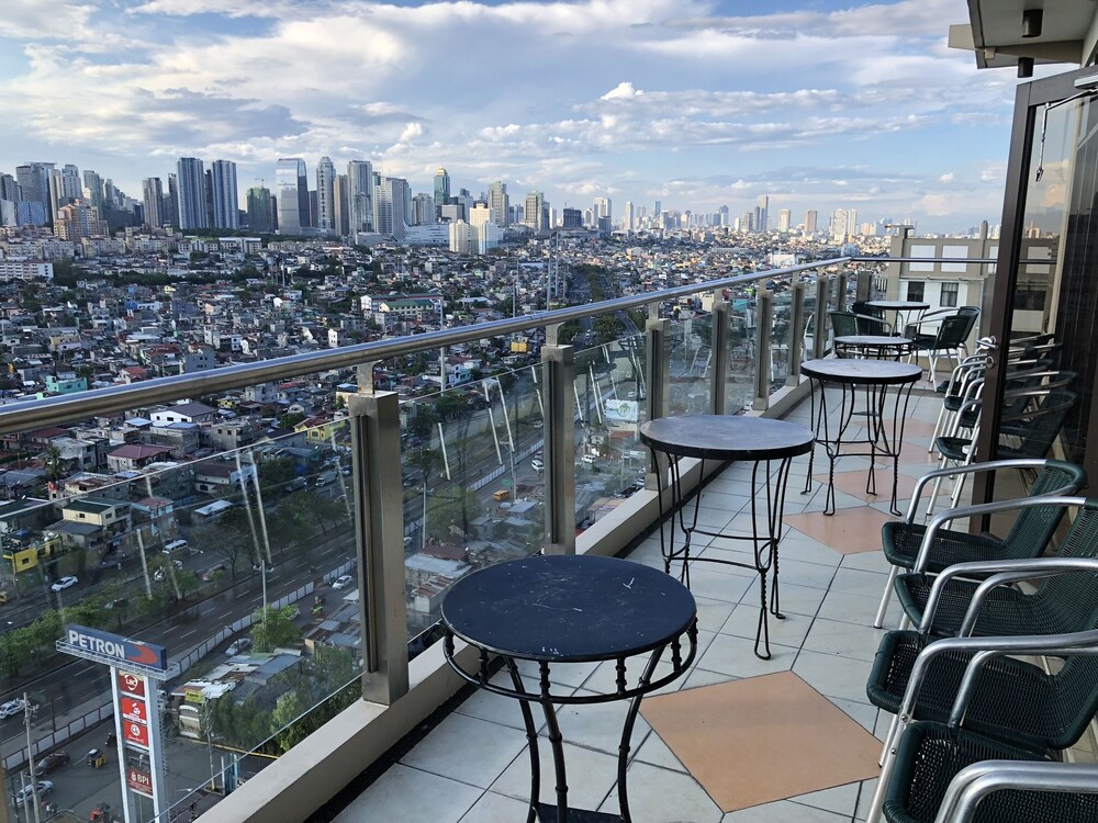 Migz N Tons Place At Cypress Towers 36/38