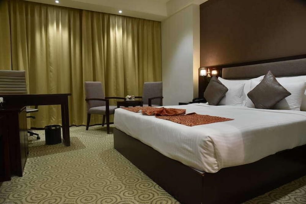 غرفة ديلوكس بسرير كينج، Pride Hotel And Convention Centre 8/10