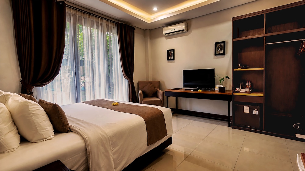 غرفة ديلوكس بسرير كينج بإطلالة على المسبح، The Visala Boutique Suites Seminyak 6/10