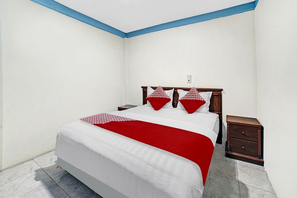 OYO 90487 Wisma Kuta Karang Baru 12/31