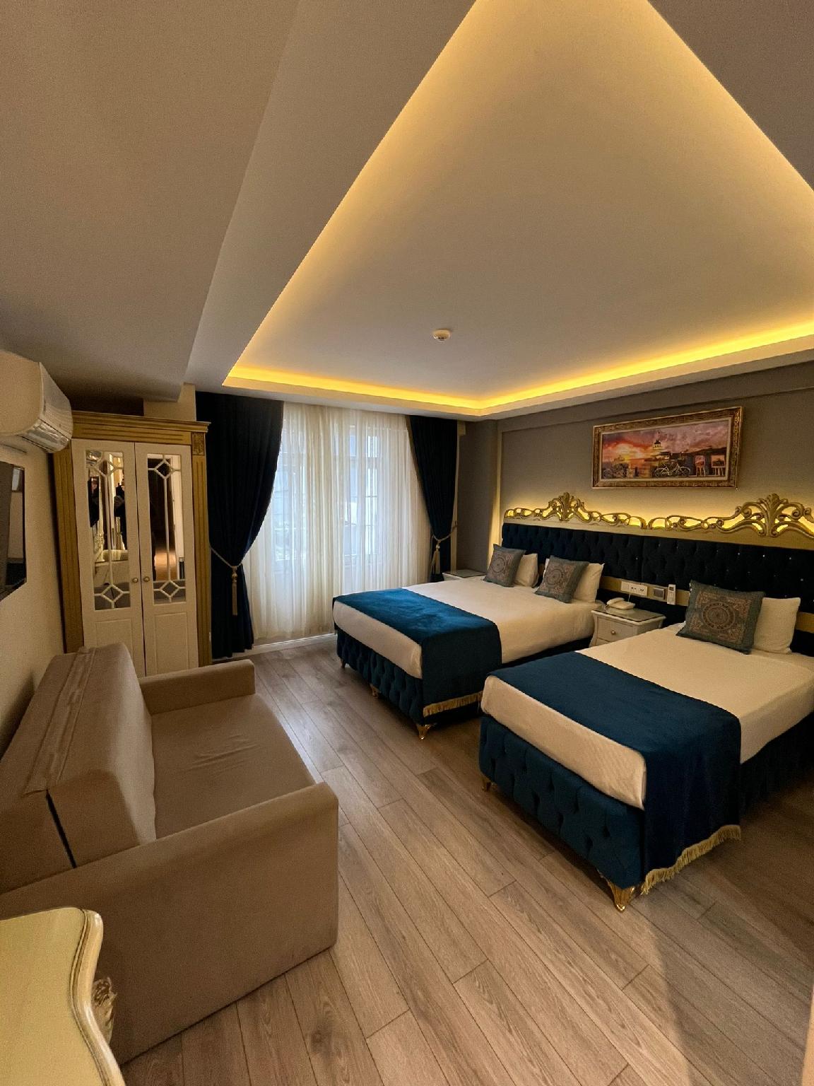 Economy, Quadruple, 1 Double and 1 Single Bed, Sofa
