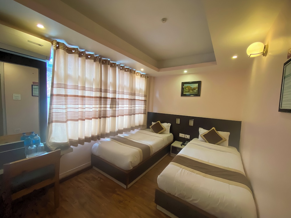 DELUXE, TWIN BEDS