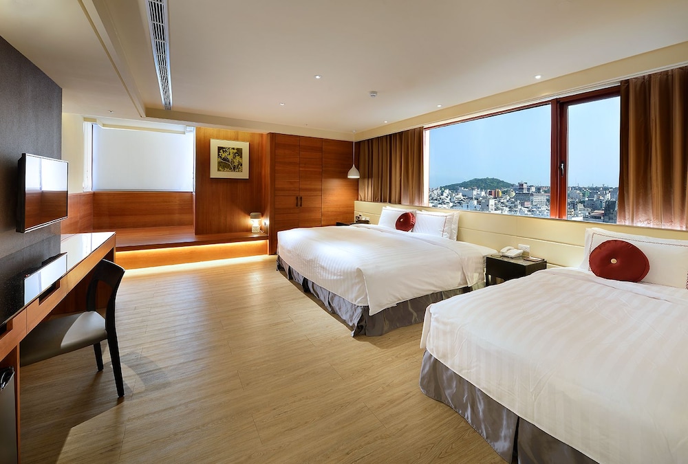 DELUXE, TRIPLE, 1 DOUBLE AND 1 SINGLE BED