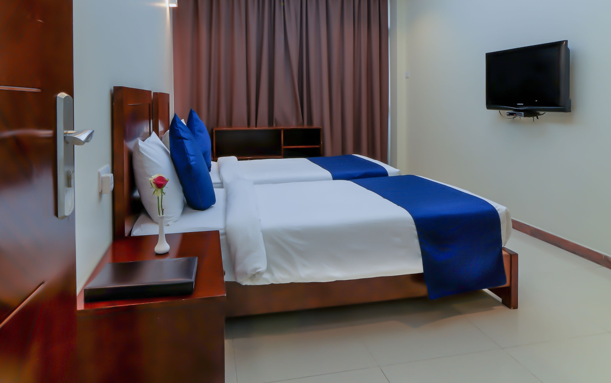 جناح عائلي بسريرين كوين وسريرين منفصلين، Tanzanite Executive Suites 5/7